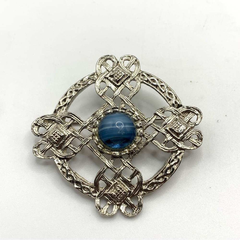 Vintage Sphinx numbered Silvertone Celtic style with striped Blue Stone